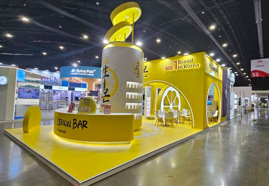 Yellow exhibition booth built by 3C Design